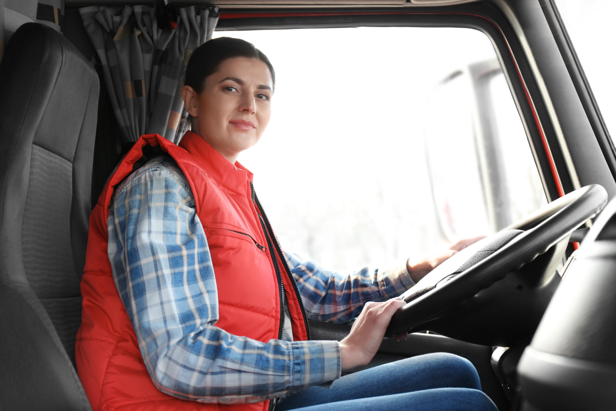 Lady in HGV cab doing HGV Training  (Cat C)