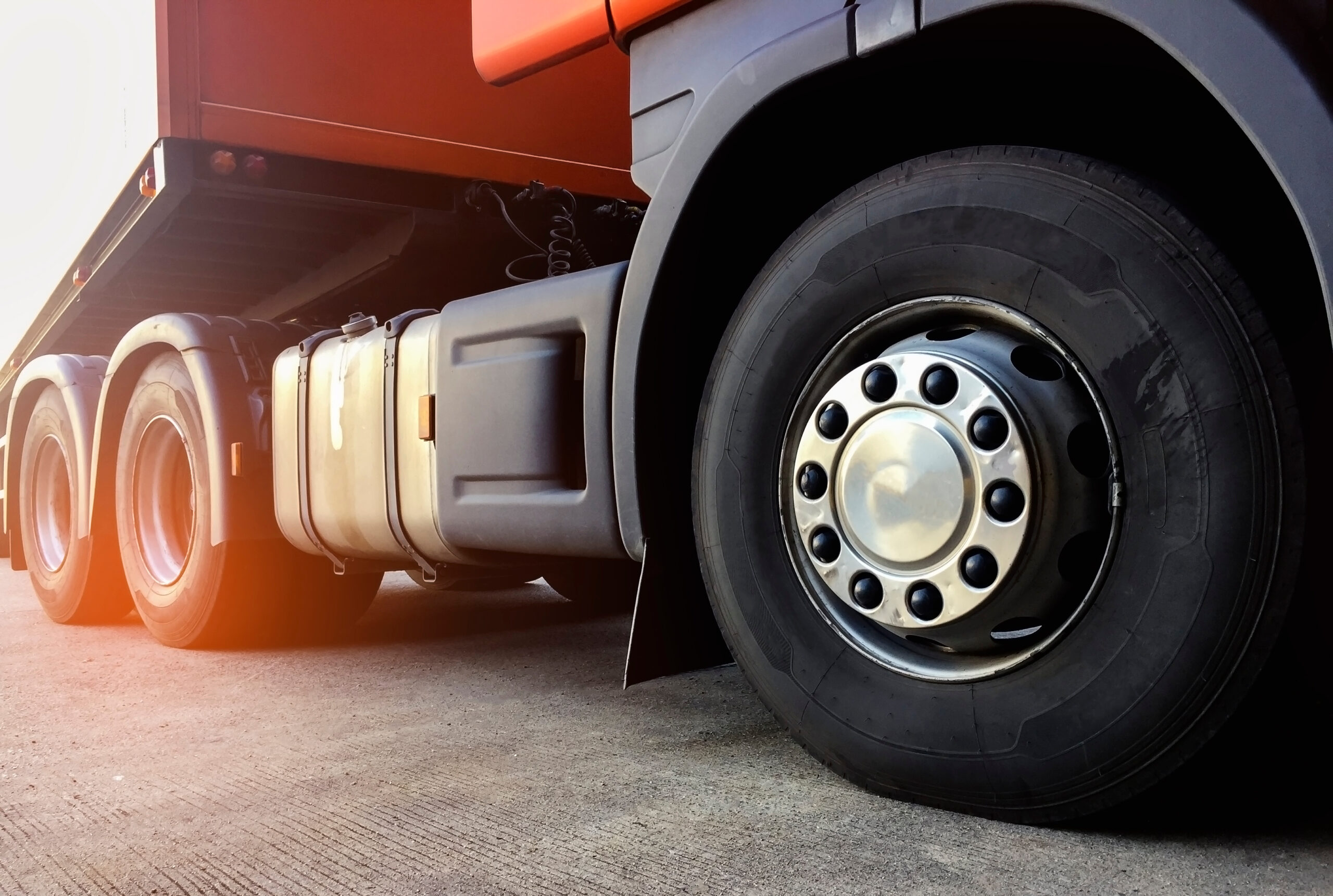Close up of HGV trailer front wheel and trailer