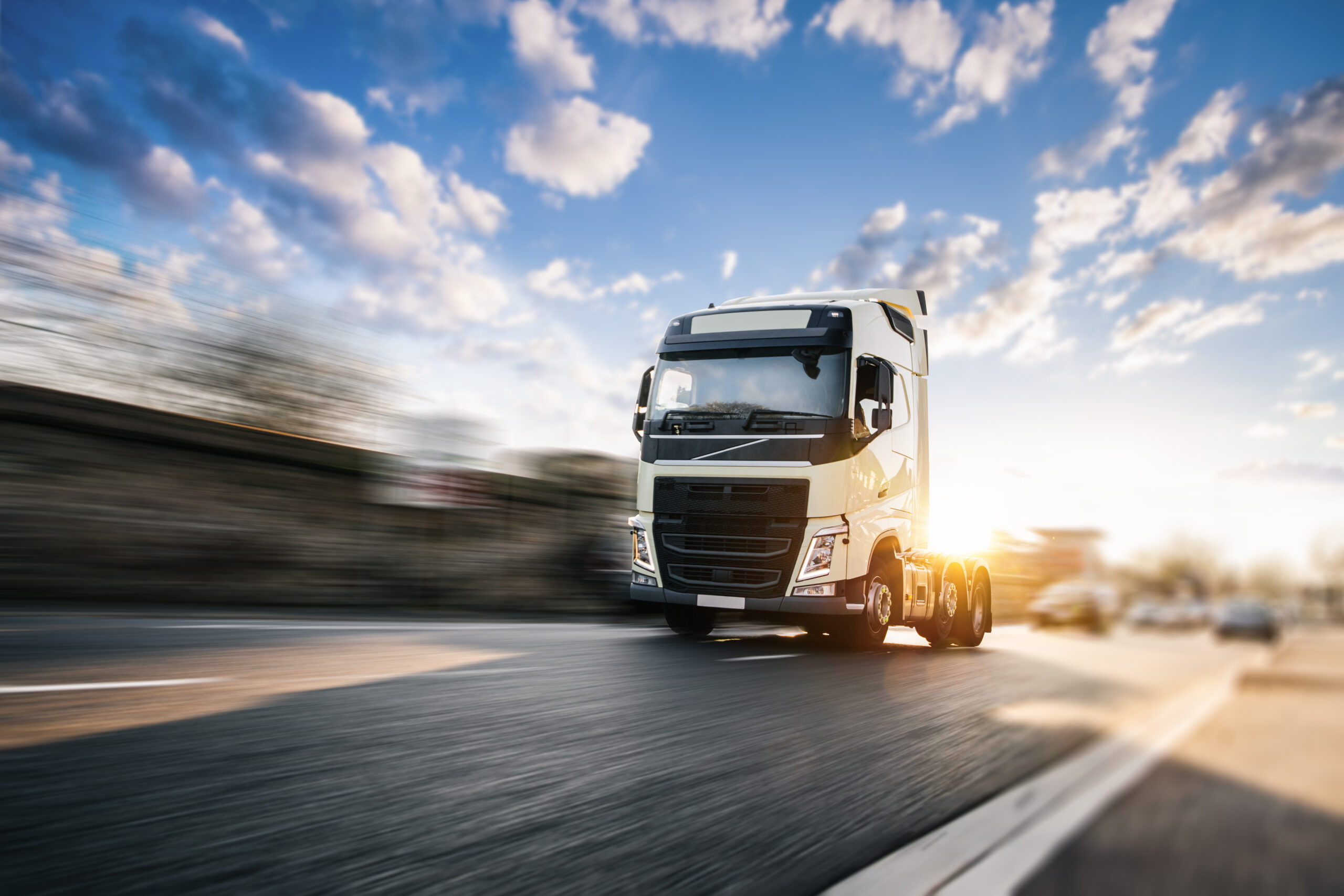 HGV without trailer on a busy road with motion blur